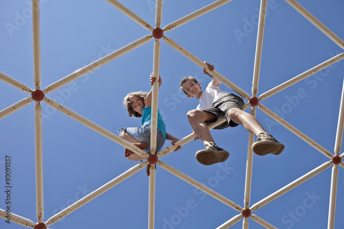 kids playing on monkey bars