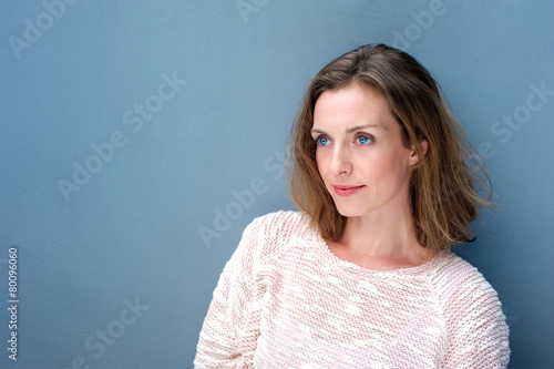Close up portrait of a charming woman in sweater © mimagephotos