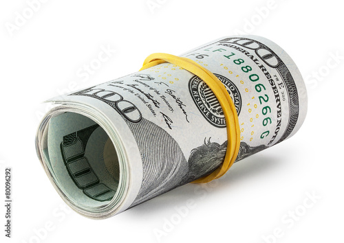Hundred-dollar bills rolled into a roll