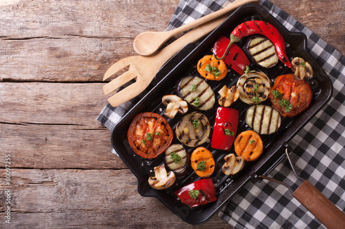 grilled vegetables in a pan grill. horizontal top view