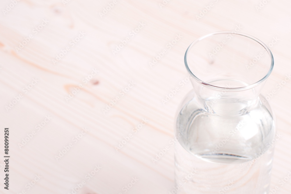 water in a glass and a napkin on the board water in a glass and a napkin on the board