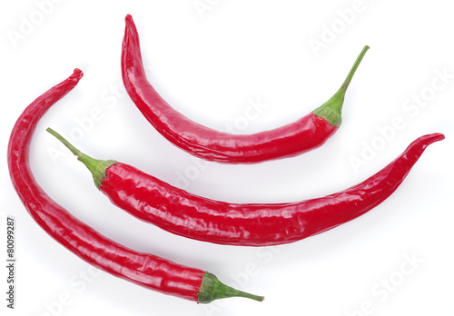 Red peppers on a white background.