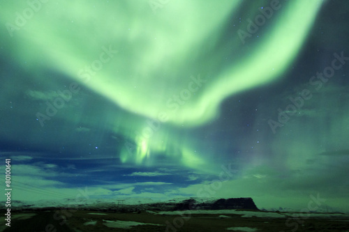 Islanda: l'aurora boreale, la notte illuminata a giorno photo