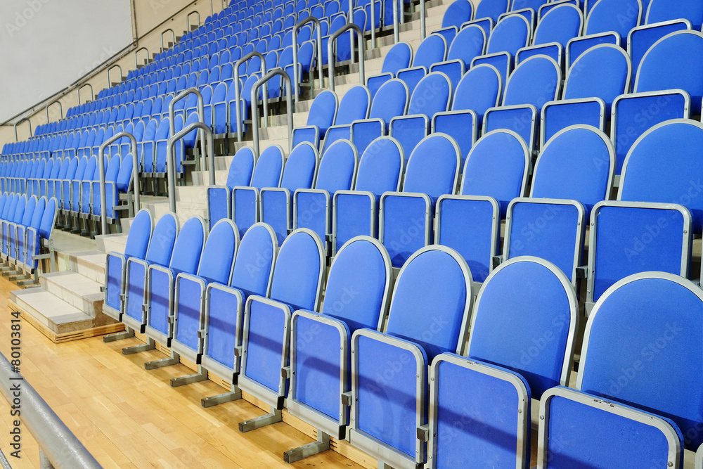 Obraz premium Blue stadium seats hall handball