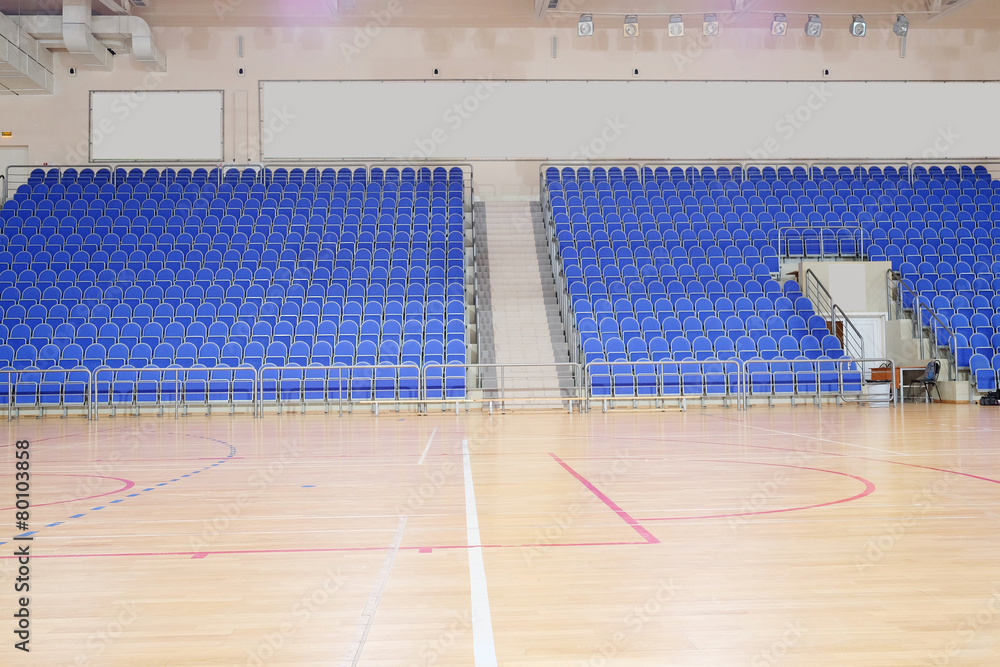 Naklejka premium Blue stadium seats hall handball