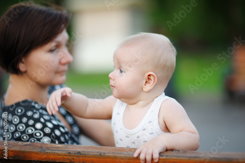 Middle aged woman and her adorable little grandson