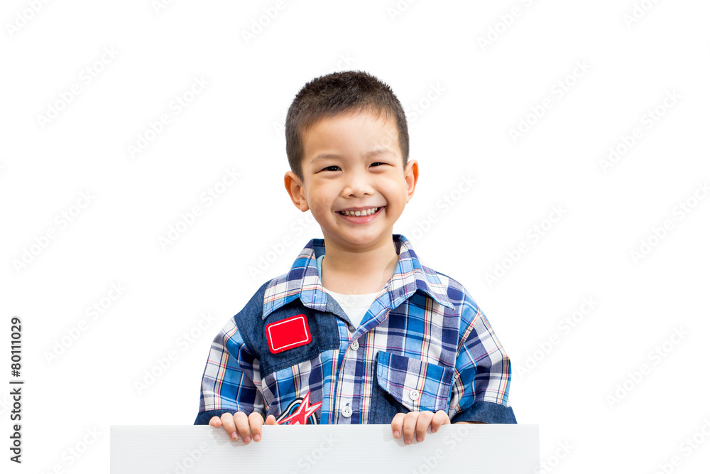 Portrait of happy little boy standing and holding empty white bo Portrait of happy little boy standing and holding empty white bo