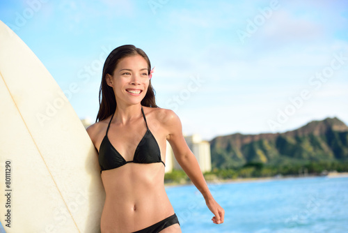 Canvas Print Surfer woman surfing on Waikiki Beach, Hawaii