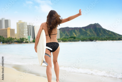 Surf fun surfer girl happy going surfing at beach