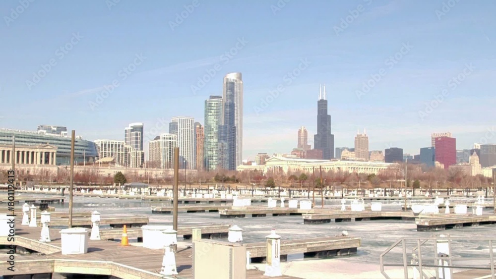 Boat harbor on Lake Michigan with snow and ice - Chicago skyline Boat harbor on Lake Michigan with snow and ice - Chicago skyline