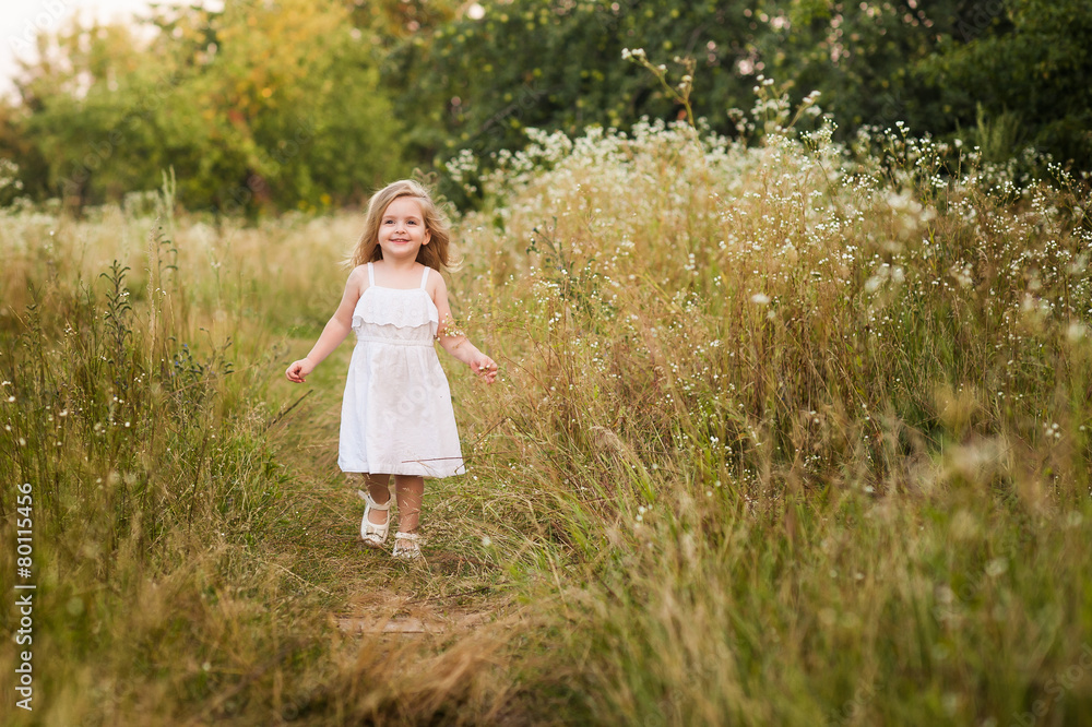beautiful blond girl outdoor on the hill on a summer day beautiful blond girl outdoor on the hill on a summer day