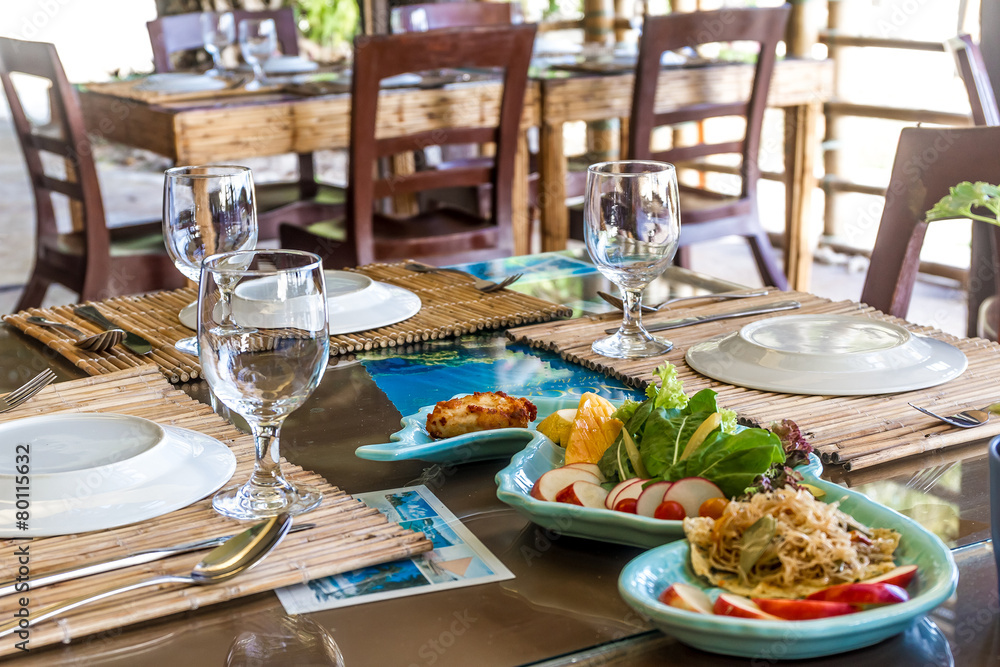 table setup in outdoor cafe, small restaurant in a hotel, summer table setup in outdoor cafe, small restaurant in a hotel, summer