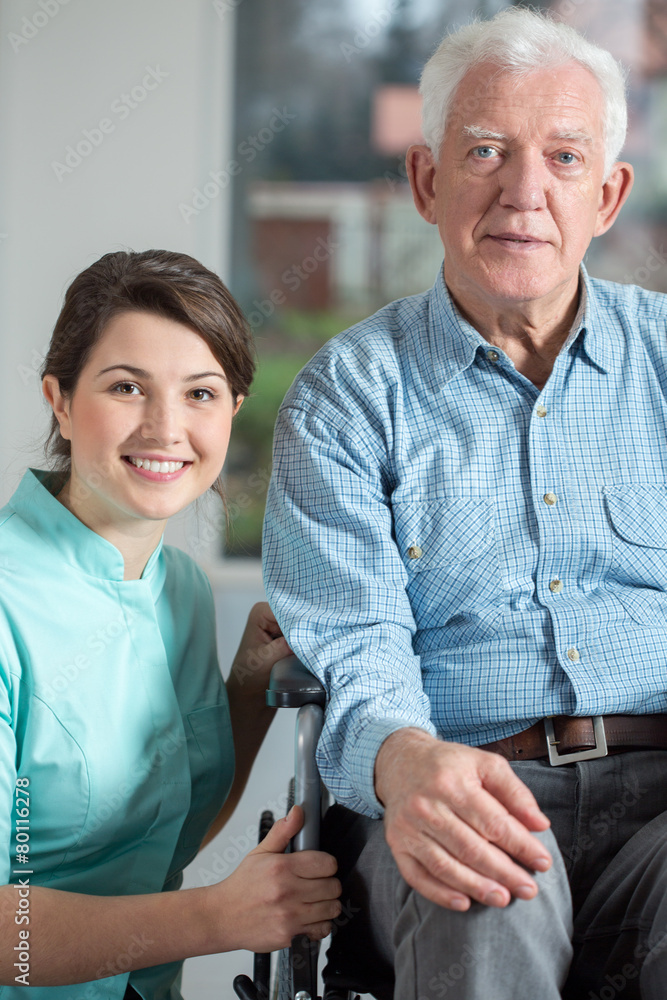 Disabled man and social welfare worker Disabled man and social welfare worker