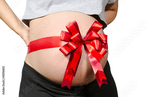 Wallpaper Mural belly of pregnant woman with red ribbon. Torontodigital.ca