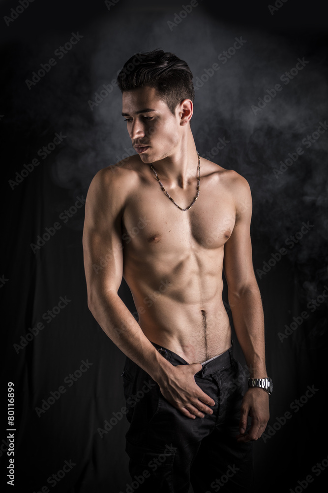 Handsome shirtless muscular young man's profile