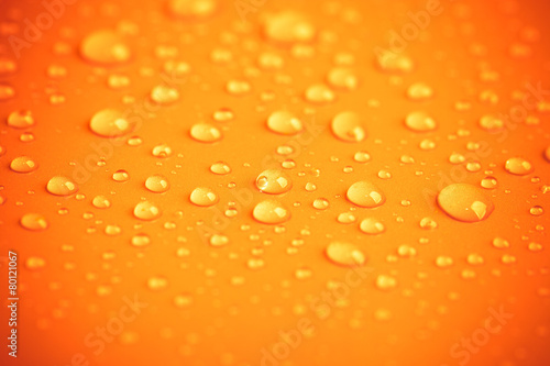 Drops of water on a color background. Shallow depth of field. To