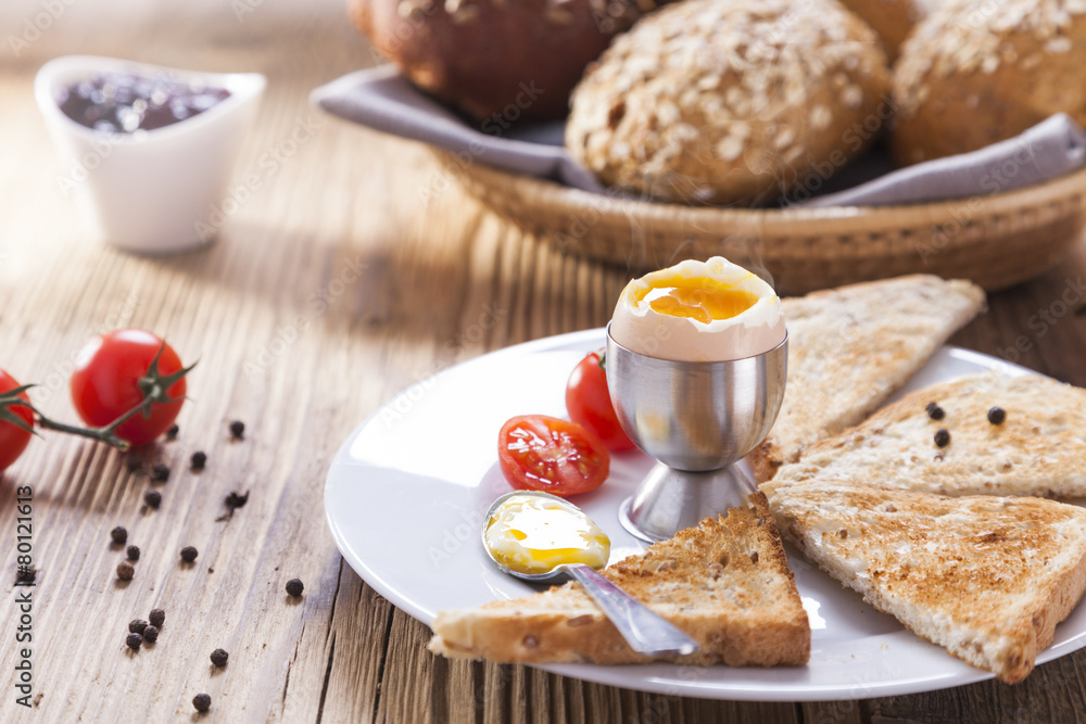 Soft-boiled egg in the morning with pepper, tomatoes and crouton Soft-boiled egg in the morning with pepper, tomatoes and crouton