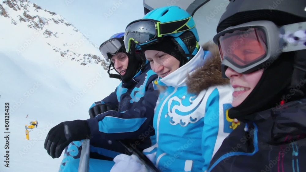 Husband rubs wife as she freezes during family ride on ropeway Husband rubs wife as she freezes during family ride on ropeway