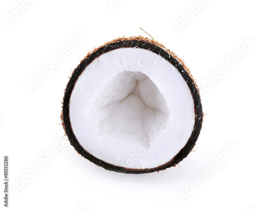Coconut cut in half isolated on white background