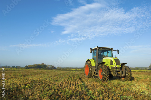 A tractor in a stubble field in Gloucestershire. photo