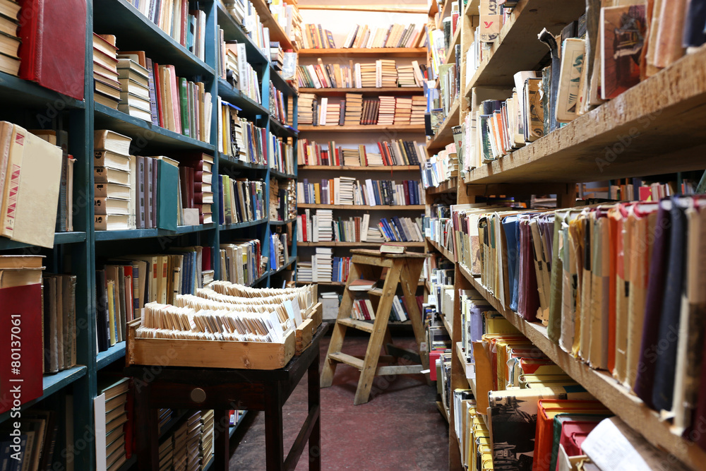 Many books on bookshelf in library Many books on bookshelf in library