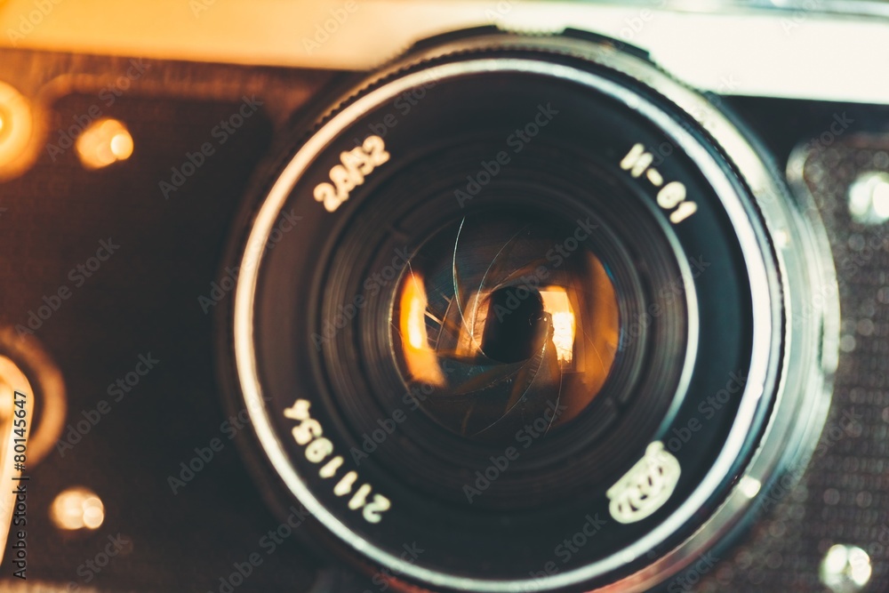 Camera. The diaphragm of a camera lens aperture. Selective focus