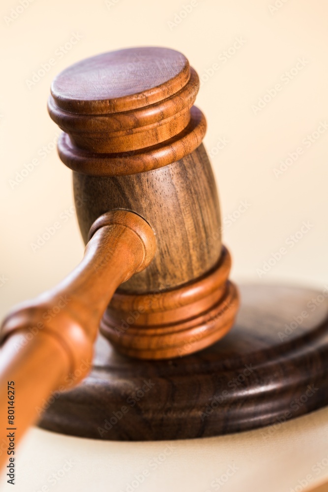 Court. Close up of a wooden judge or auctioneers gavel with a Court. Close up of a wooden judge or auctioneers gavel with a