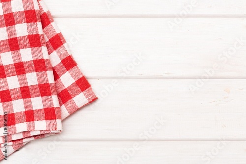 Background. checkered napkin on wooden table