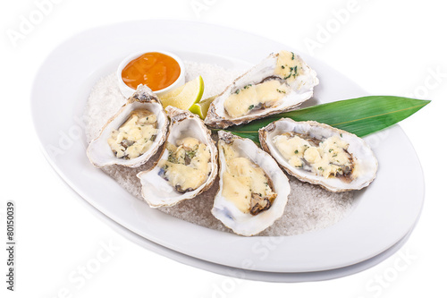 Oysters on white plate