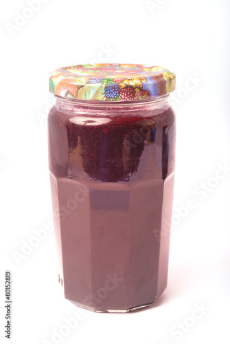 Jar of jam on a white background