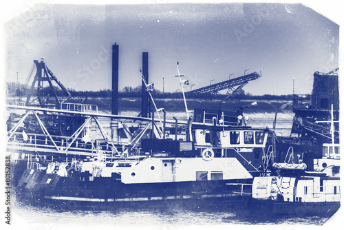 Ships moored at a shipyard photo