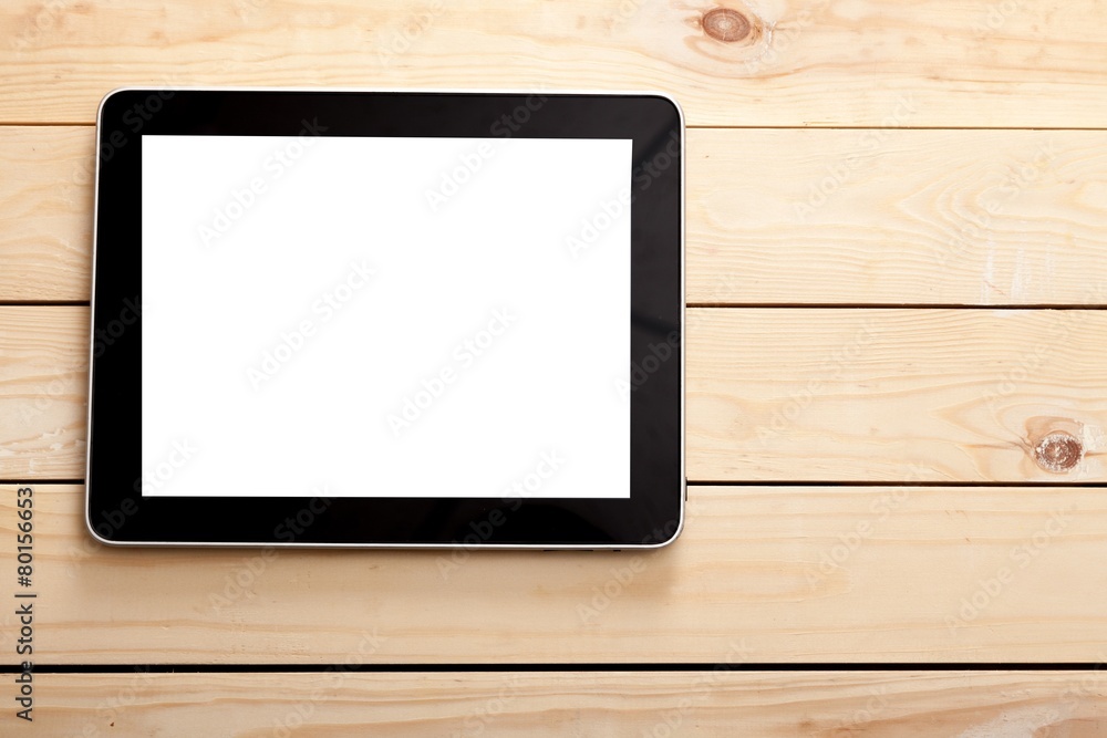 Ipad. Black tablet computer with isolated screen on an old