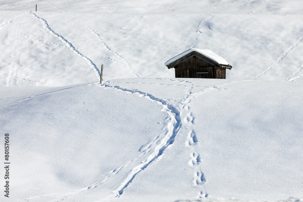 Traditional wooden hut in snow, Alps, Germany Traditional wooden hut in snow, Alps, Germany