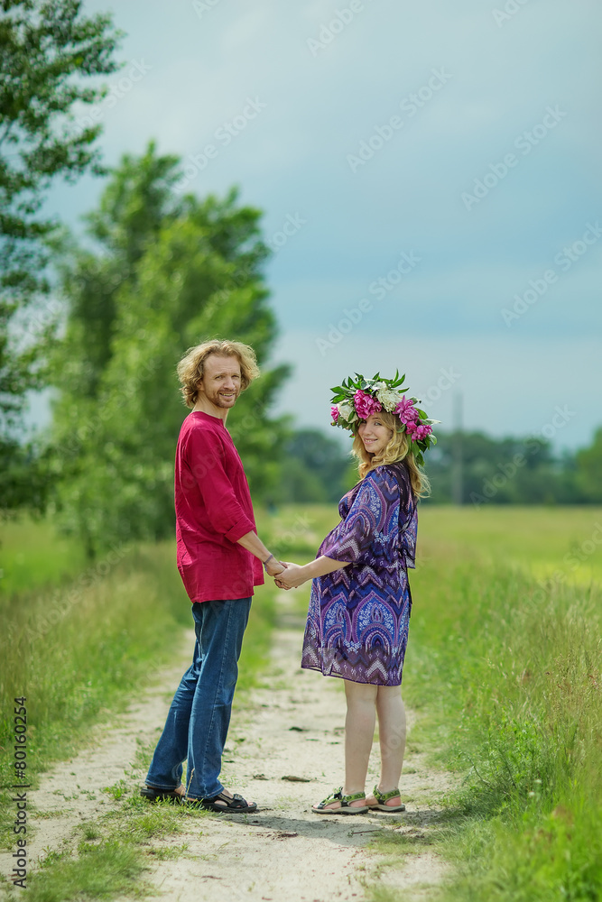 Happy pregnant couple in nature Happy pregnant couple in nature