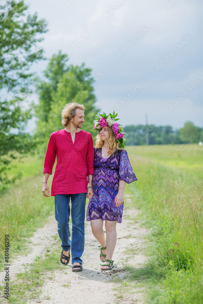 Happy pregnant couple in nature Happy pregnant couple in nature