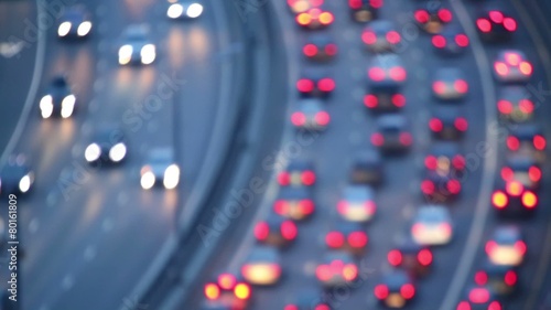 Blured view to motion cars traffic with lights on highway photo