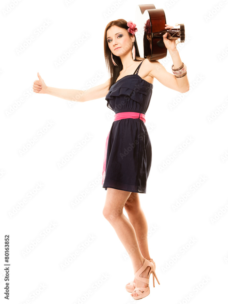 girl with guitar thumbing and hitch hiking isolated girl with guitar thumbing and hitch hiking isolated
