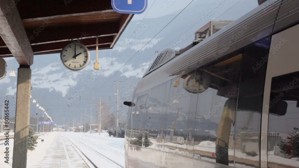 Train stand on railway station at winter day in village Train stand on railway station at winter day in village