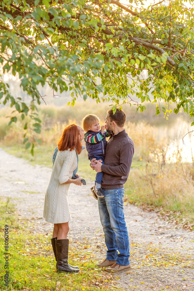 Young Attractive Parents and Child Portrait Young Attractive Parents and Child Portrait