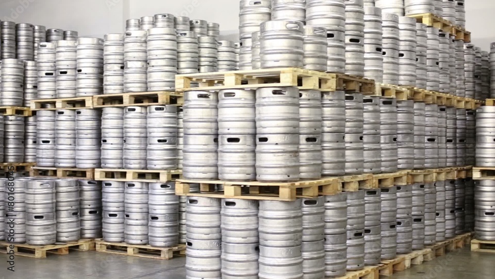 Forklift standing with beer kegs in warehouse brewery Forklift standing with beer kegs in warehouse brewery