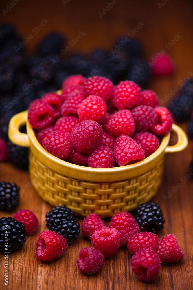 Raspberries in ceramic bowl Raspberries in ceramic bowl