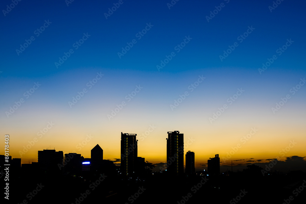 Silhouette building in Bangkok at sunset.