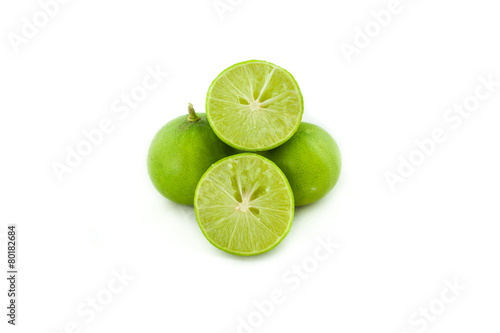 Fresh green lemon  isolated on white background