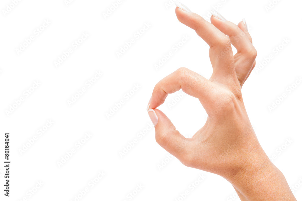 Hand OK sign on white background