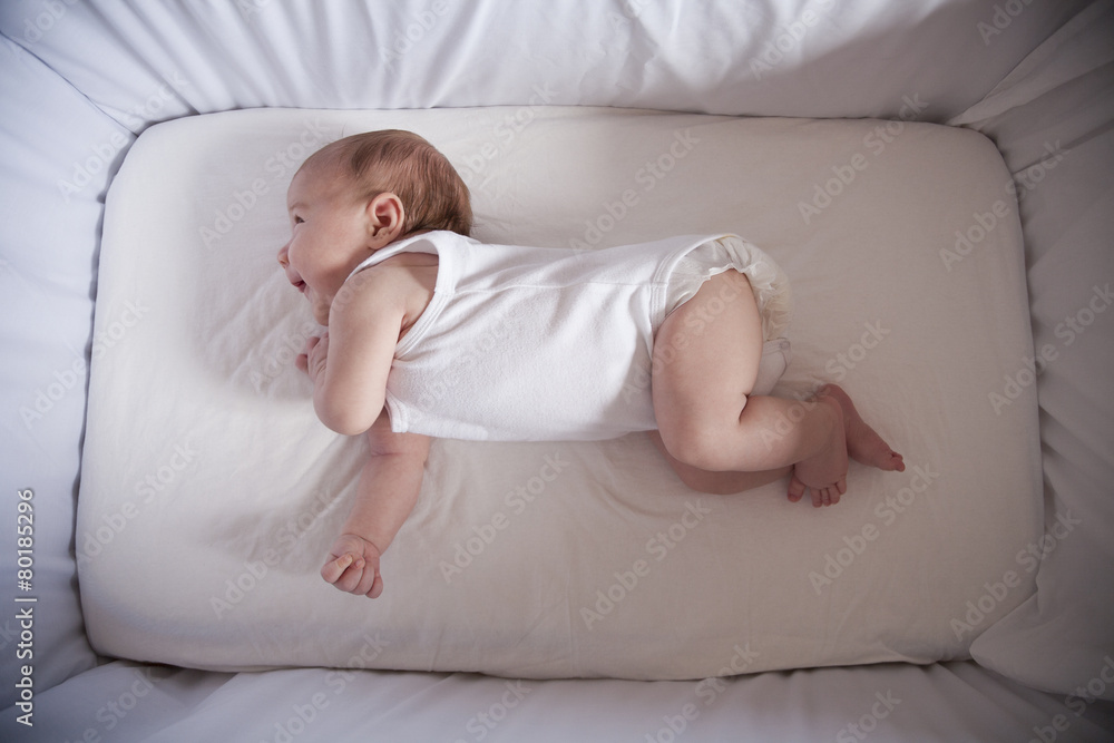 newborn laughing in cradle newborn laughing in cradle