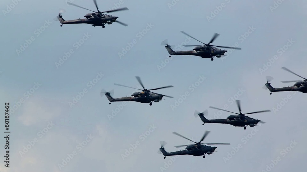 Mi-28N (Berkuts aerobatic team) fly in sky on air show Mi-28N (Berkuts aerobatic team) fly in sky on air show