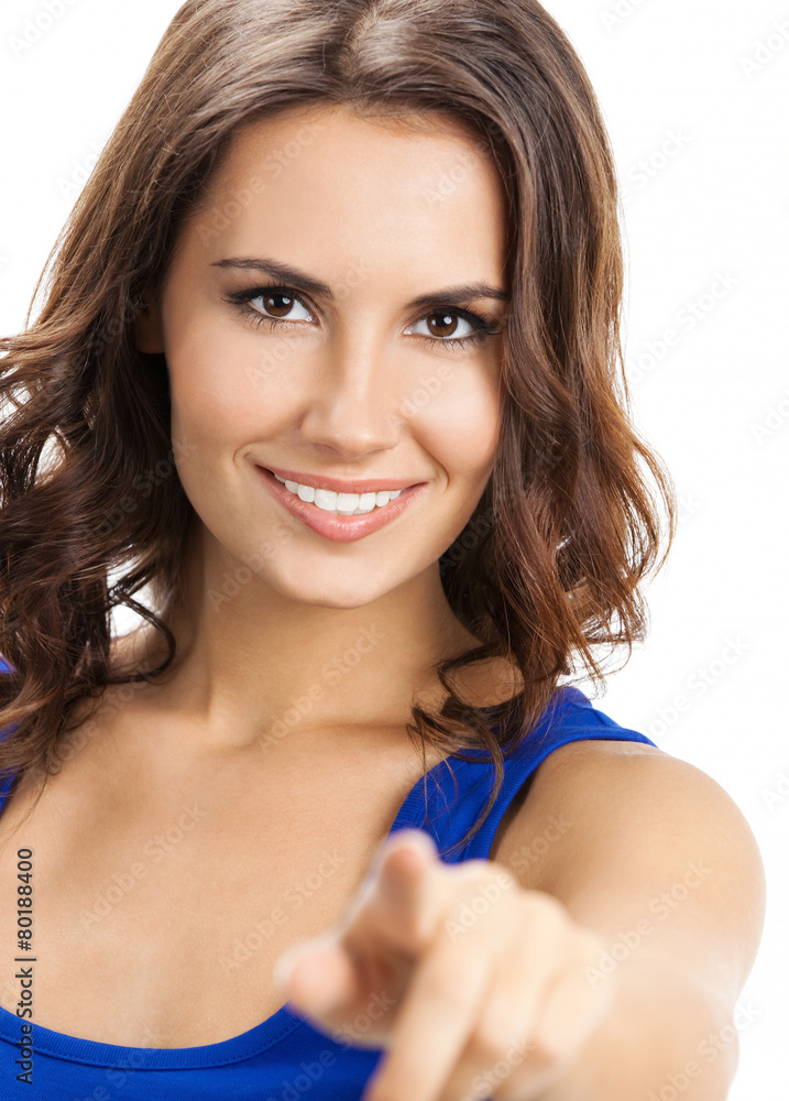 Woman pointing at something or pressing virual button, over whit Woman pointing at something or pressing virual button, over whit