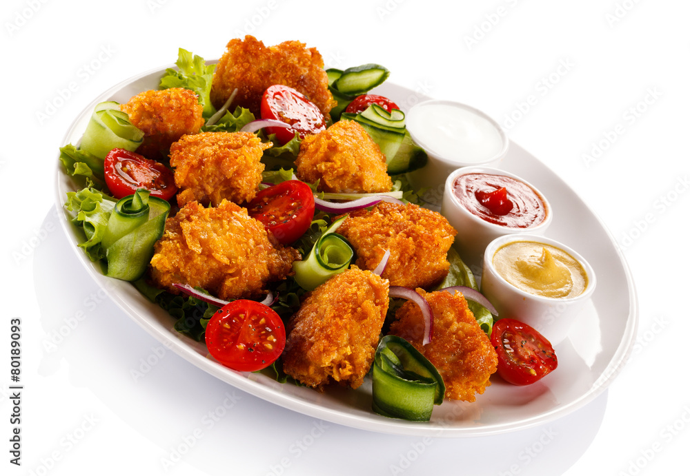 Fried chicken nuggets and vegetables Fried chicken nuggets and vegetables