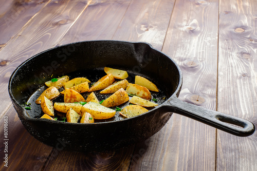 Hot fried potatoes in a pan