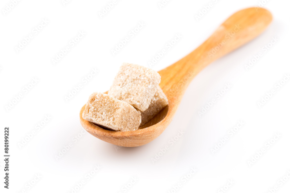 brown sugar in a wooden spoon